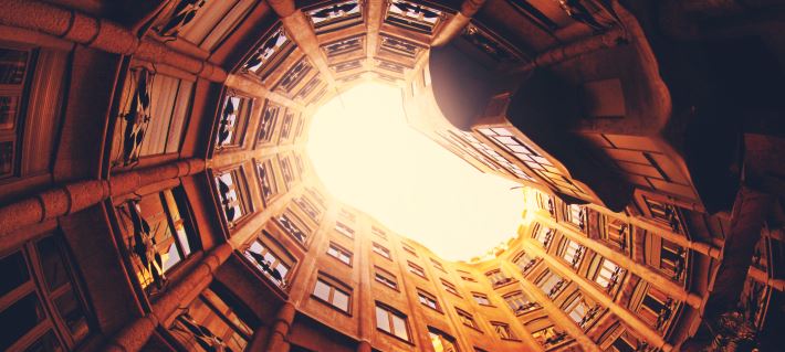 photo of the sky seen from an inner courtyard, article header image